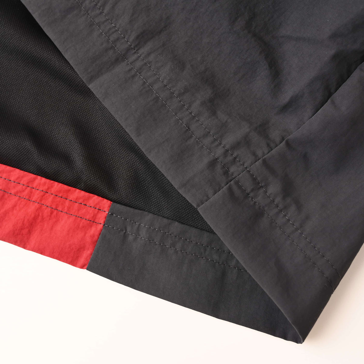BALENCIAGA BLCG Nylon Long Sleeve T-Shirt with Black and Red Logo Detailing